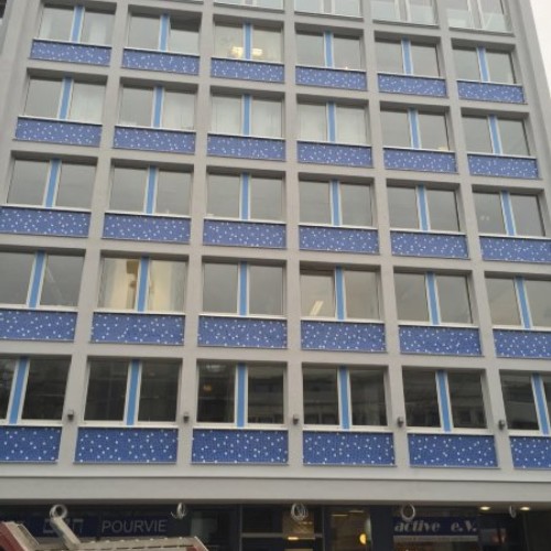 Mosaikarbeiten an einer Hauswand in Saarbrücken